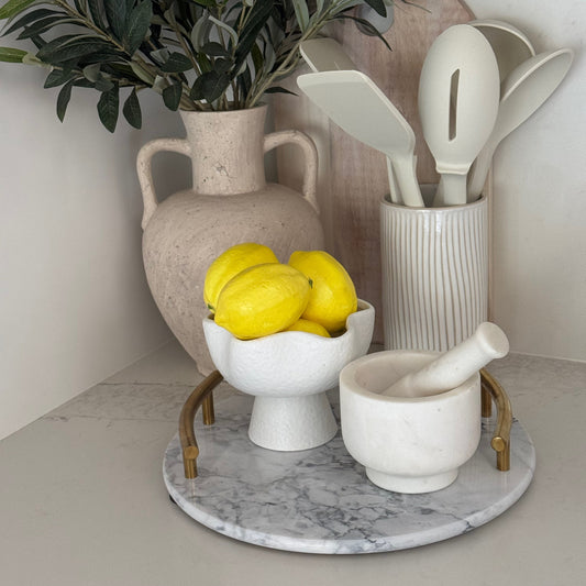 A round marble serving tray with gold handles - Meen Tribe