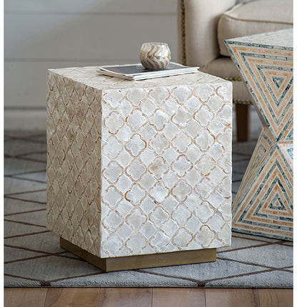 Decorative side table with mosaic pattern in a living room setting - Meen Tribe